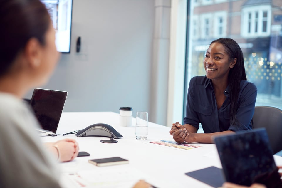 Business woman chatting at desk-1