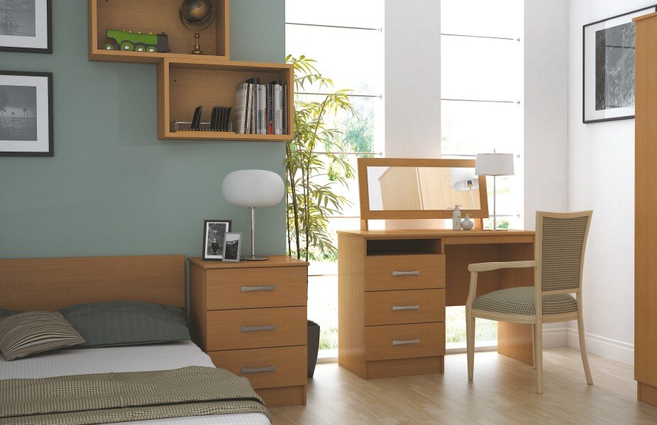 bedroom with shelves, chest of drawers and desk