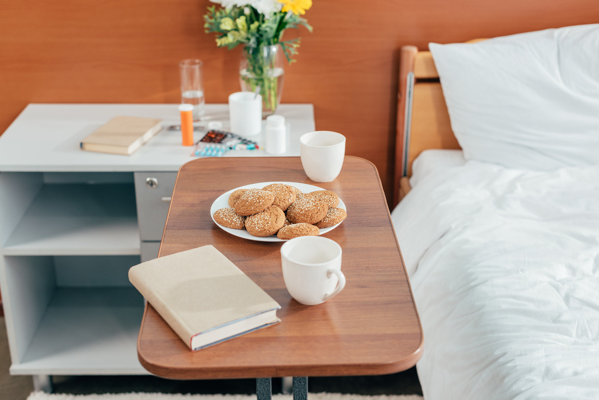 Bed side table with wheels